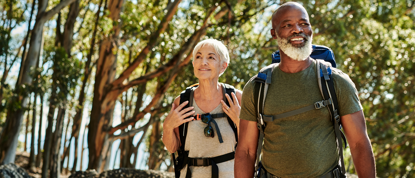 man and woman walking outside